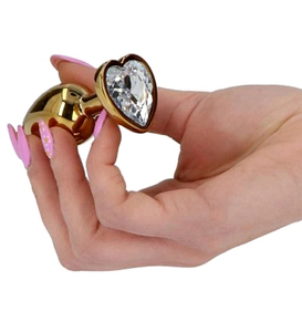 Zlatá zátka s diamantovým srdcem