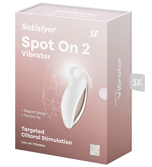 Bílý masážní přístroj na klitoris