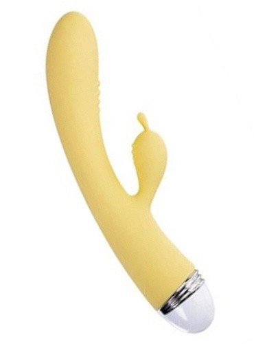 Žlutý vibrátor s výstupkem pro stimulaci klitorisu